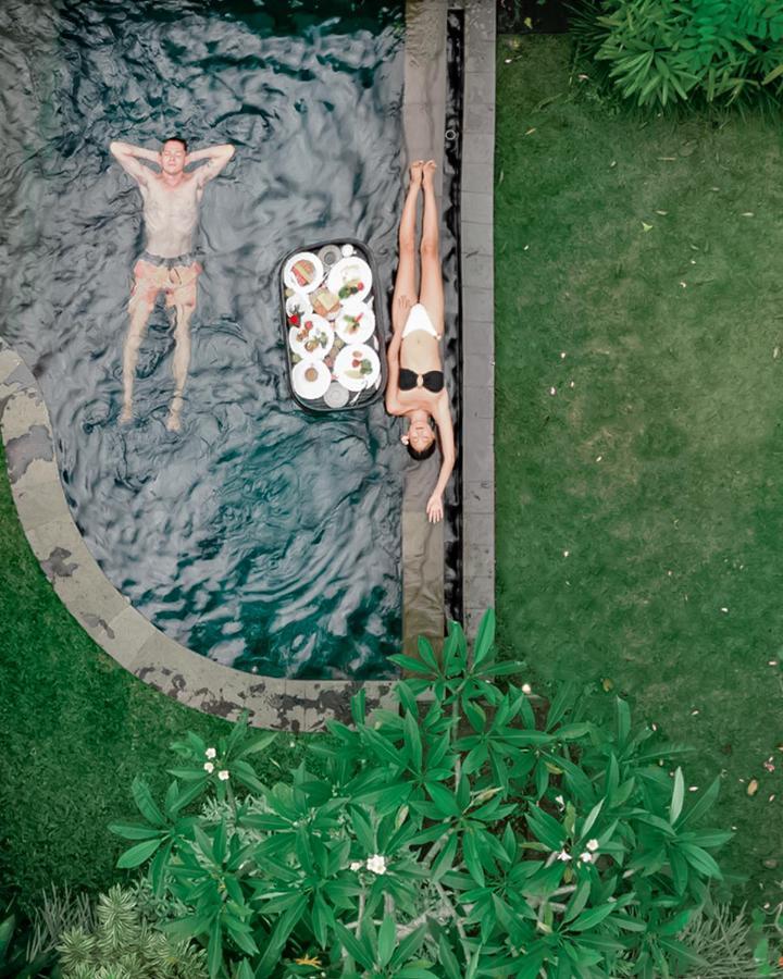 Tejaprana Bisma - Chse Certified Hotel Ubud  Luaran gambar A woman sunbathing in a swimming pool